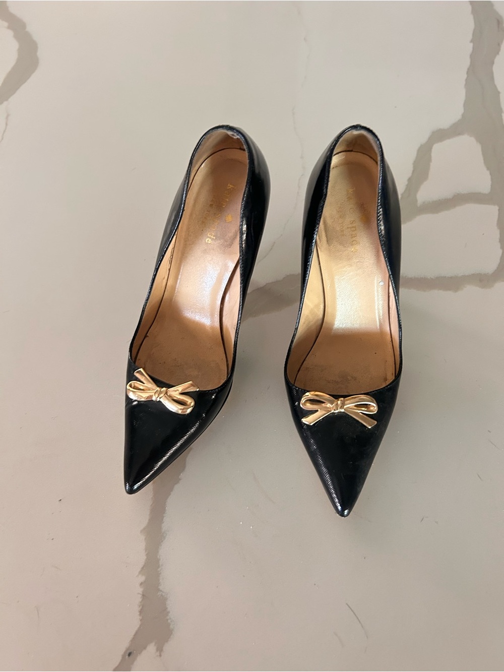 kate spade Black Pointed-Toe Pumps with Gold Bow